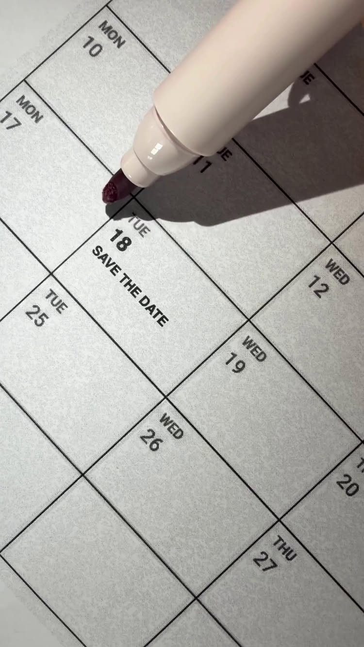 Pink marker circling Tuesday the 18th on a calendar with Save the Date text.