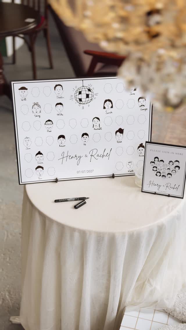 Draw yourself guest book board with sketches on a white draped table