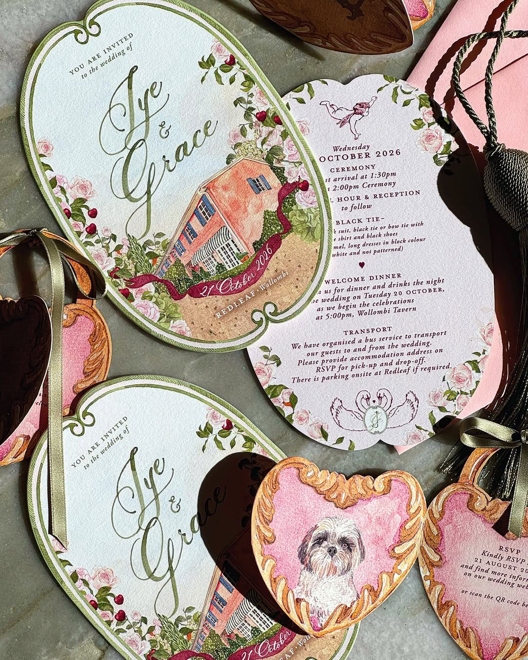 Hand painted wedding invitations with watercolor house and dog illustrations and gold edges.