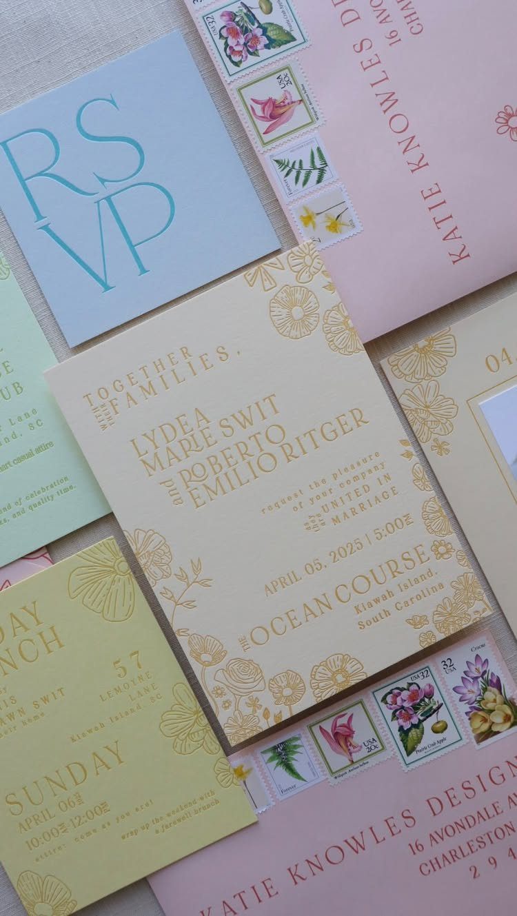Wedding invitation suite with yellow, blue, and pink cards featuring elegant typography.
