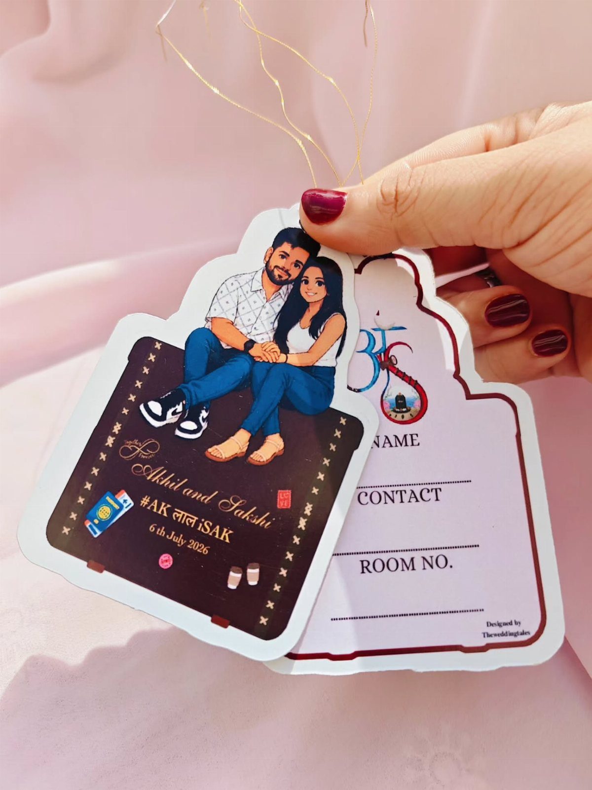 Custom luggage tag save the date with couple illustration and contact details.
