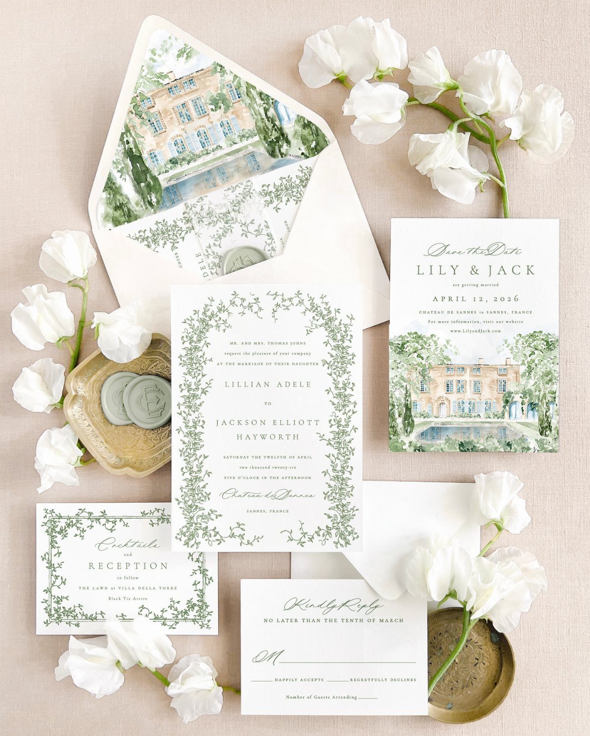 Wedding stationery set with green watercolor leaf borders and a manor house illustration.