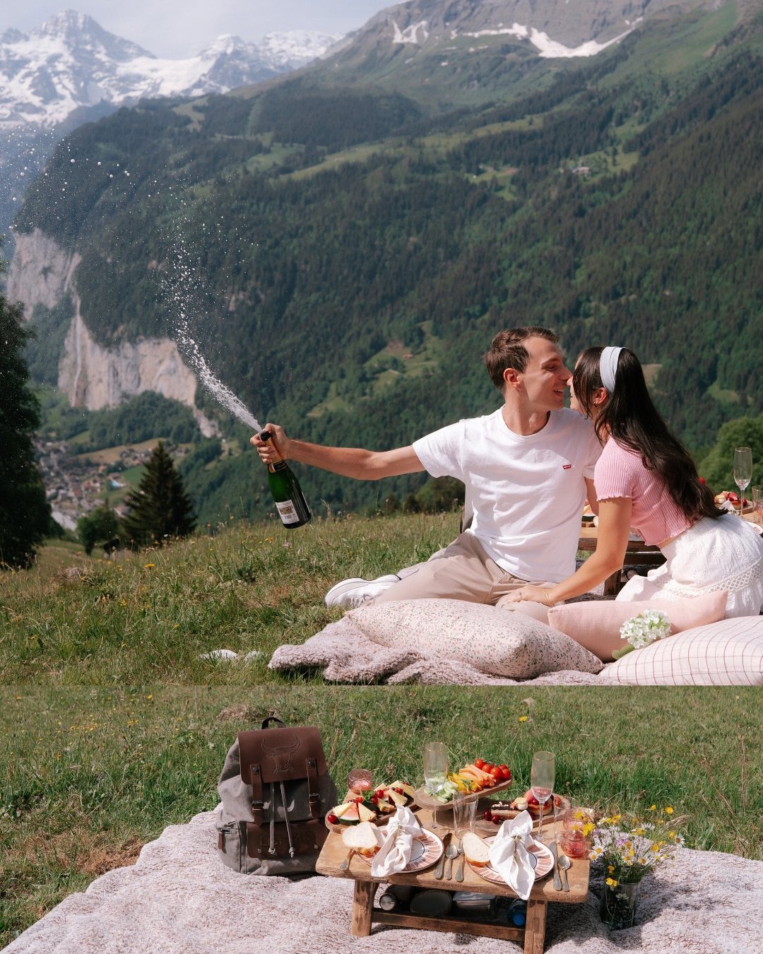Couple kissing in a mountain meadow while popping champagne during a picnic.