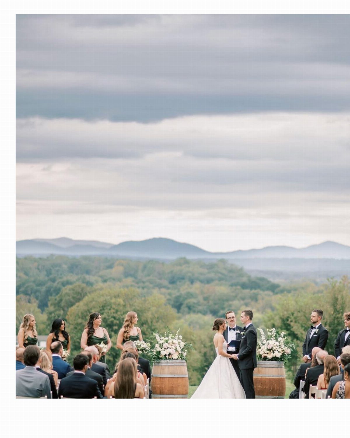 Bride and groom during an outdoor wedding ceremony with mountain views in background